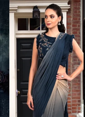 Woman wearing a ready-to-wear saree effortlessly in minutes.